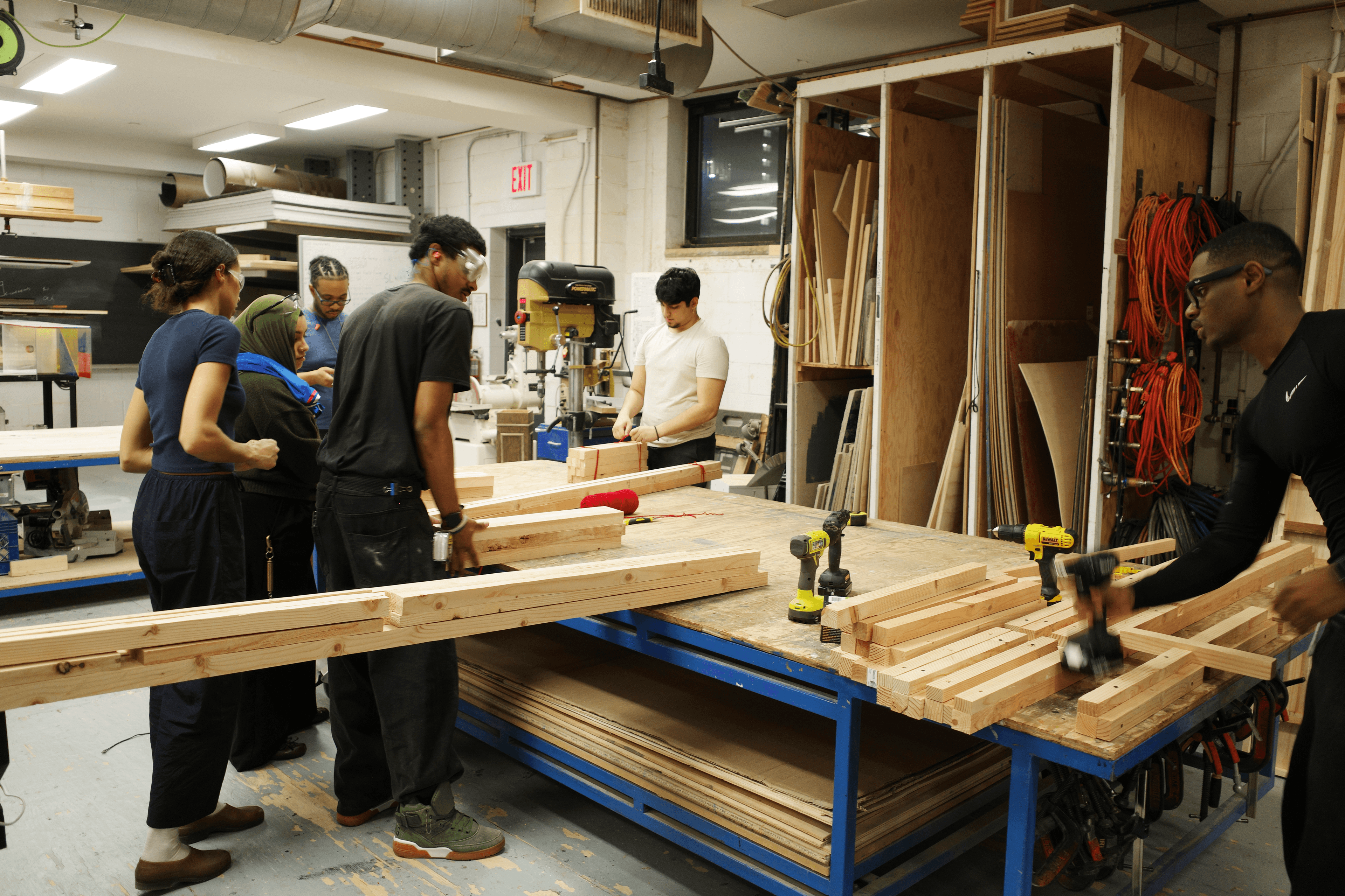 CityTech student in woodshop producing installation for annual student exhibition
